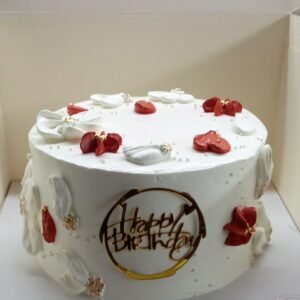 White cake with red hearts