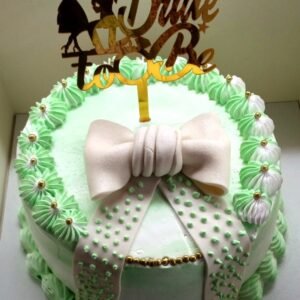Fondant bow greenish cake