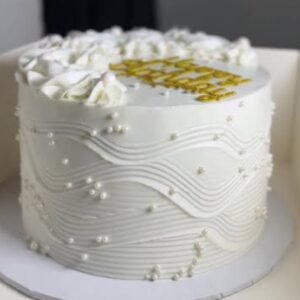 White cake with white pearls