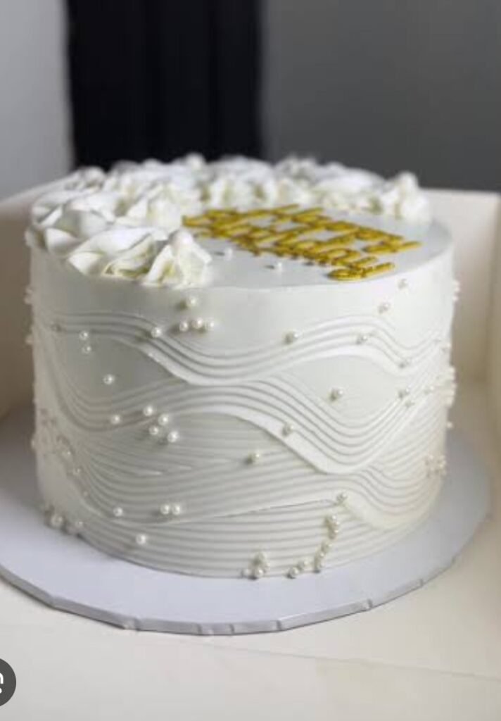White cake with white pearls