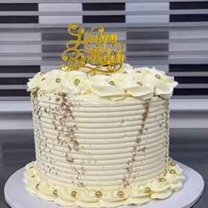White cake with golden pearls