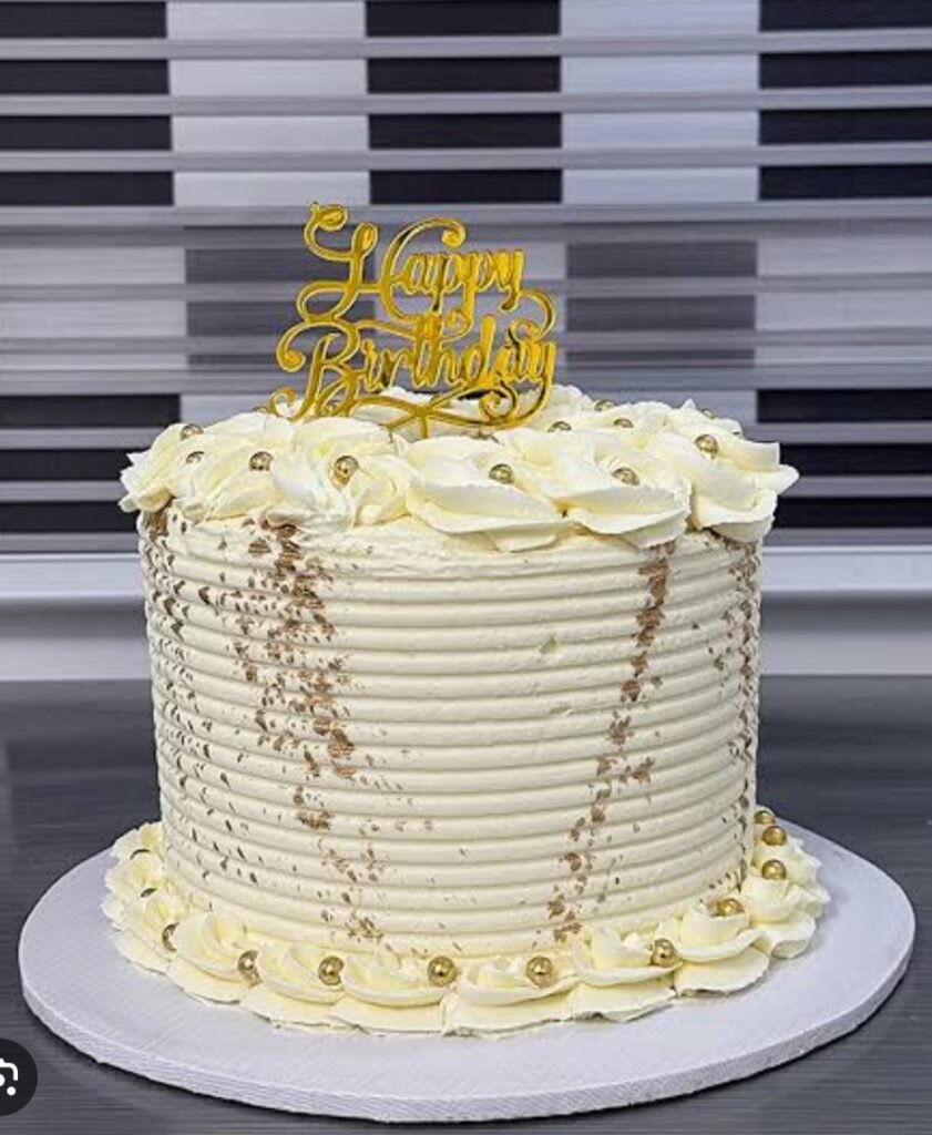 White cake with golden pearls