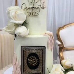 Two tier white quran theme cake with white flowers