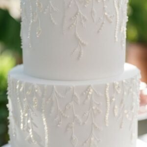 White cake with vines on edges
