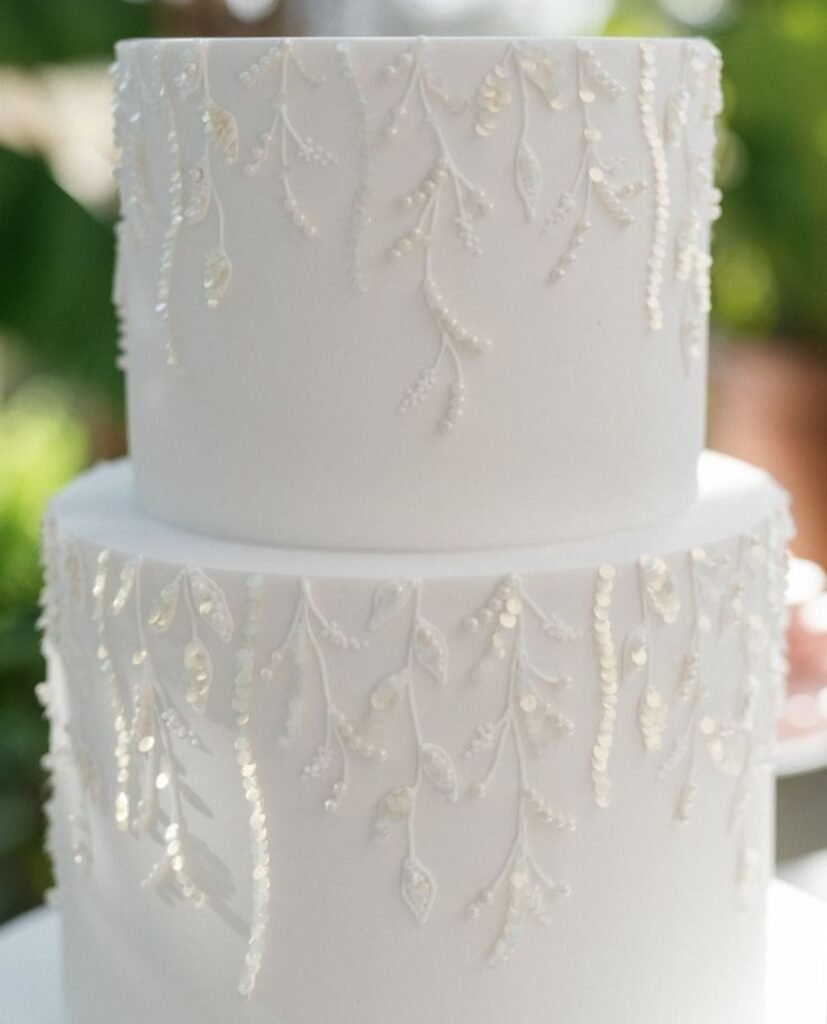 White cake with vines on edges