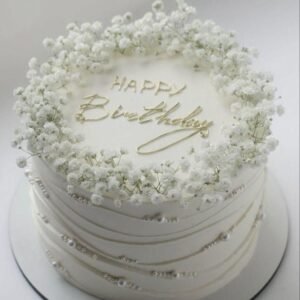 White baby breath birthday cake