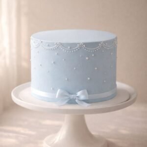 Light blue beaded cake with elegent lace