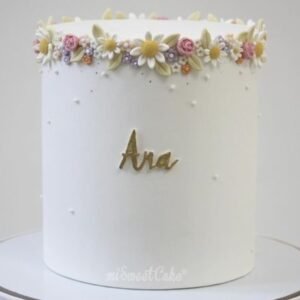 Fondant flowers crown white cake