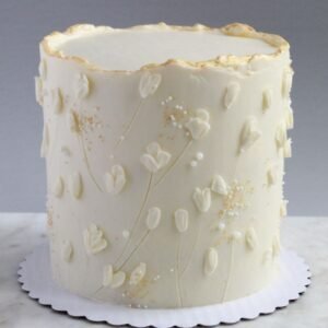 White flower vine on cake