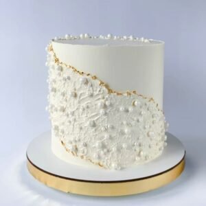Designer cake with tappered beads and gold foil