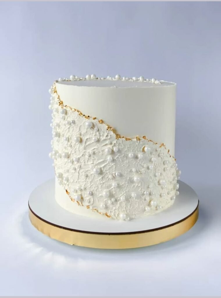 Designer cake with tappered beads and gold foil