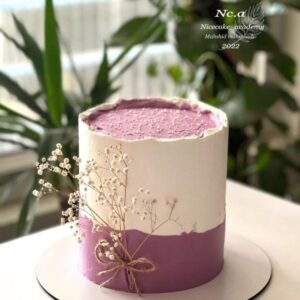 Purple white theme tall cake with baby breath