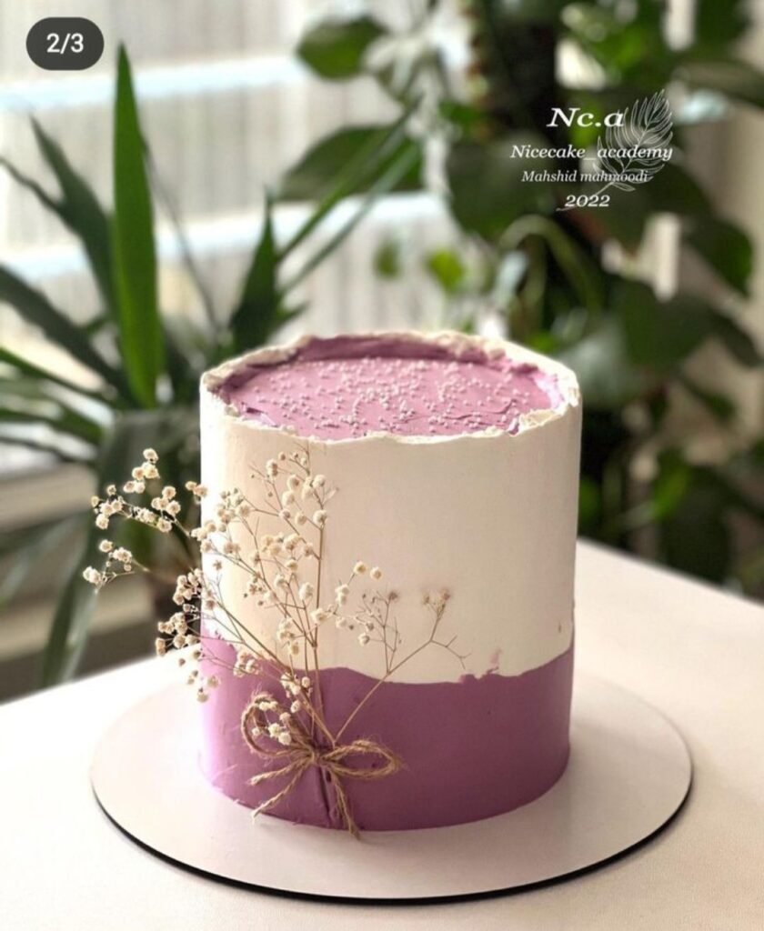 Purple white theme tall cake with baby breath