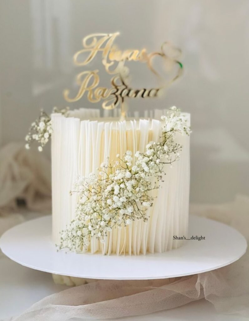 Modern style cake with waffer paper edge with baby breadth