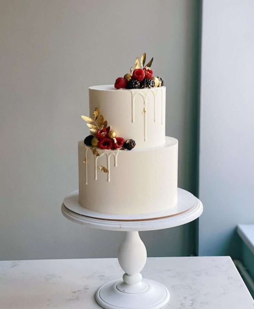 White cake with berries