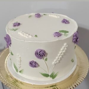 White cake with mosaic flowers