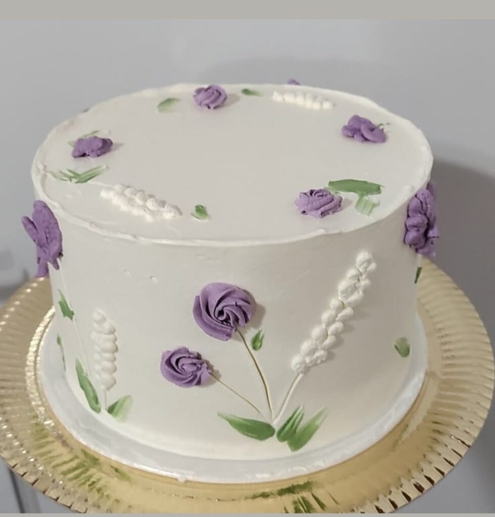 White cake with mosaic flowers