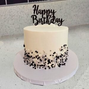 Black and white sprinkles cake