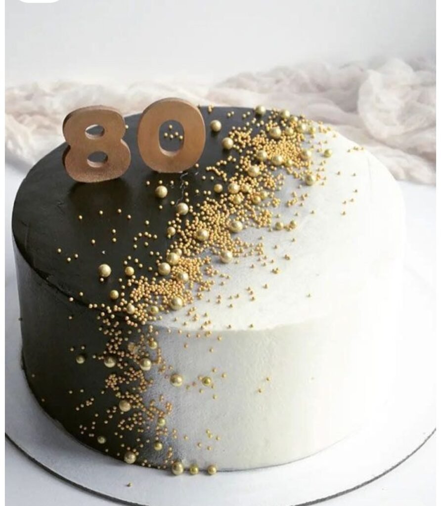 Black and white theme with golden sprinkles cake
