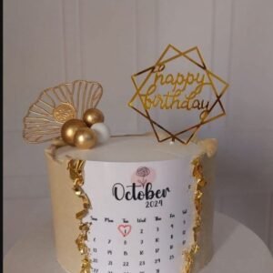 White and golden calendar theme cake