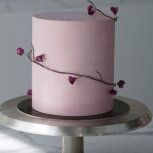 Pink cake with spiral vine