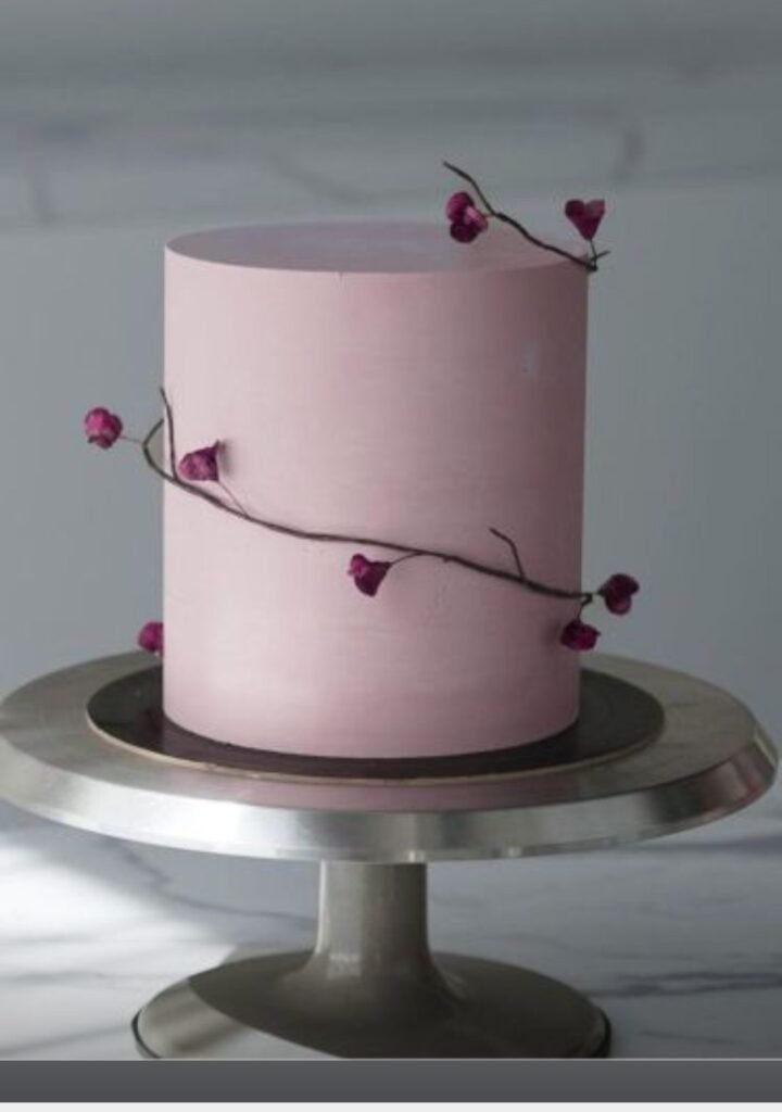 Pink cake with spiral vine