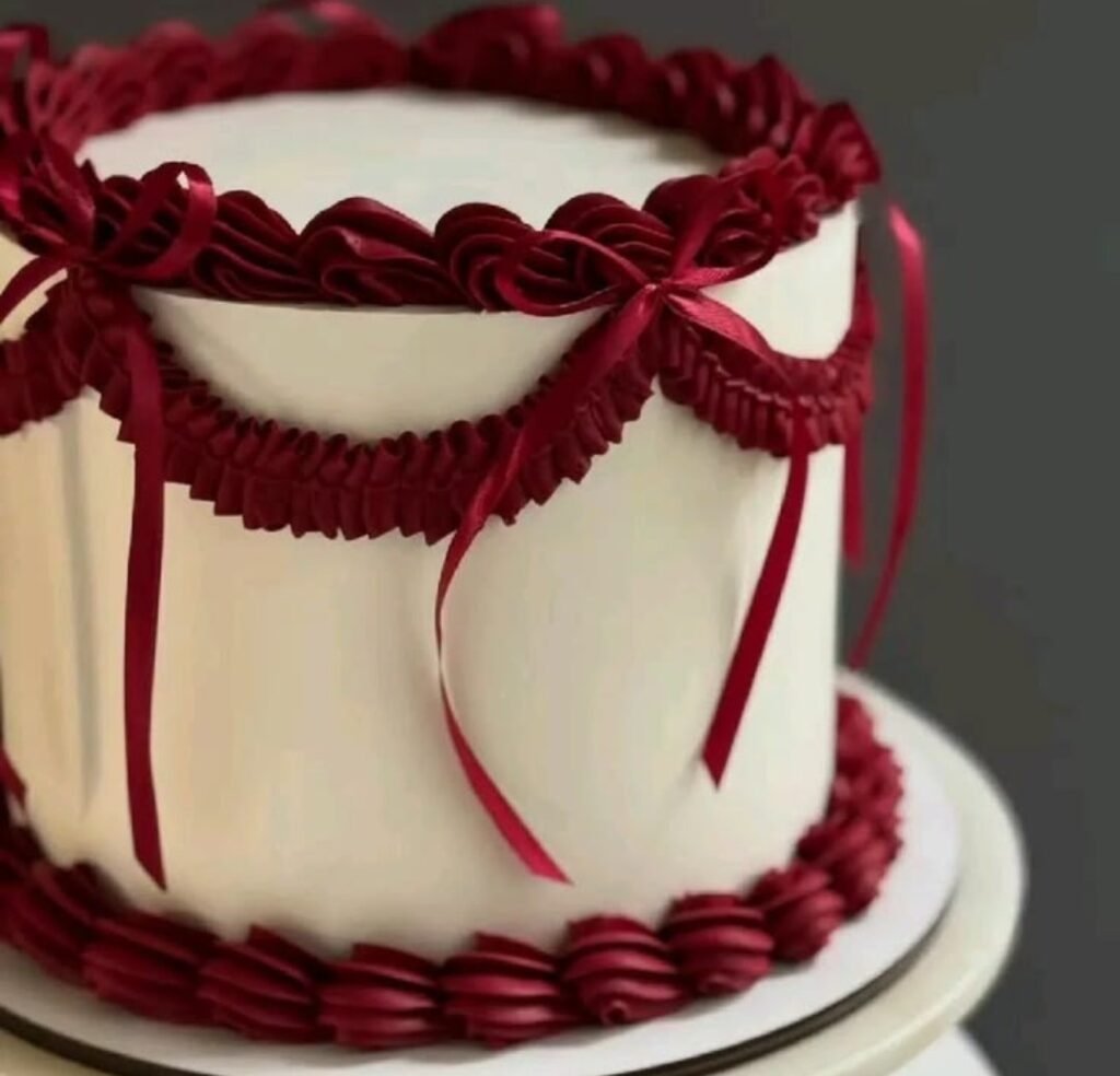 White cake with red lace