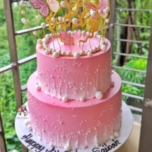 Pink and white theme birthday cake