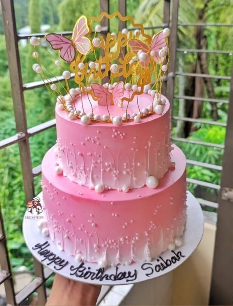 Pink and white theme birthday cake