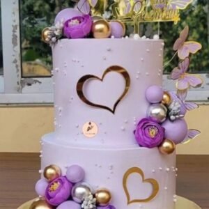 Double tier purple theme cake