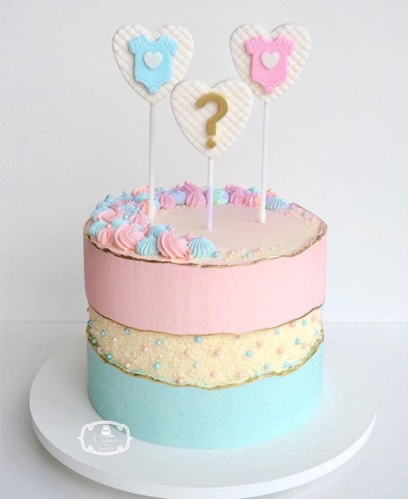 Beautiful heart toppers gender revealing cake