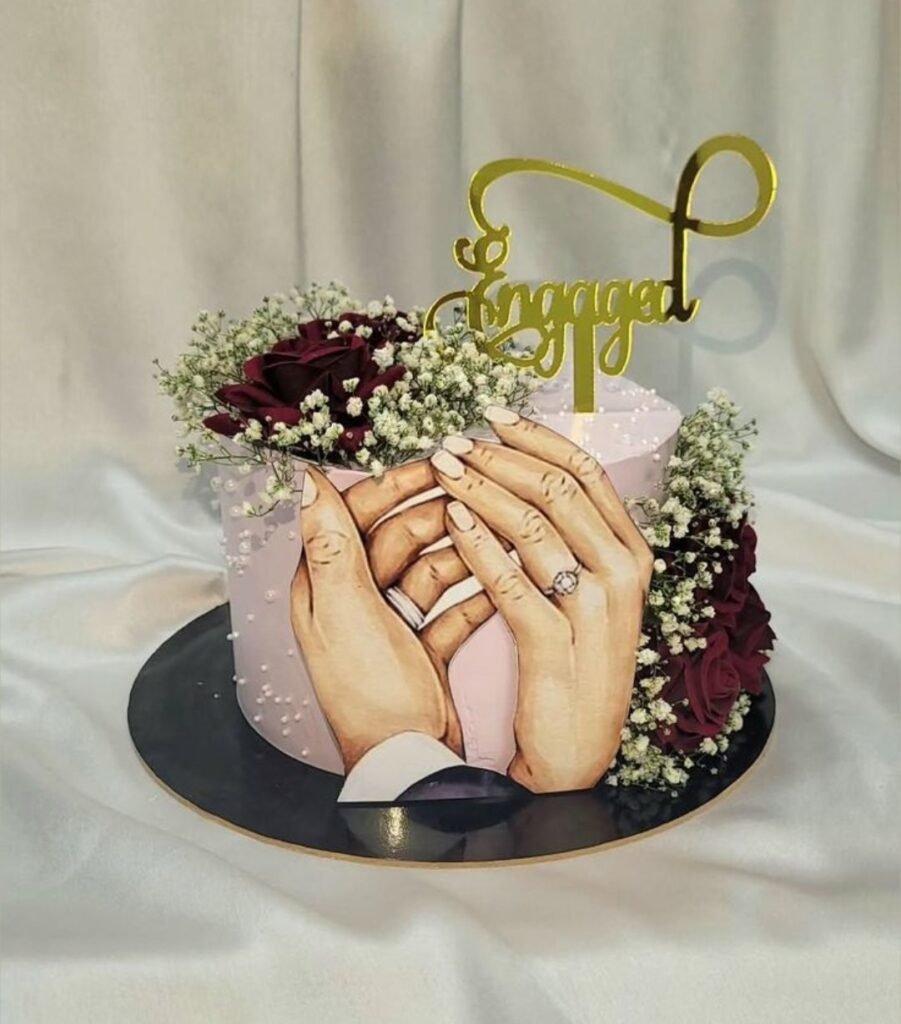 Male and female hand theme engaement cake