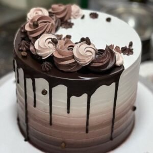 White cake with chocolate dips