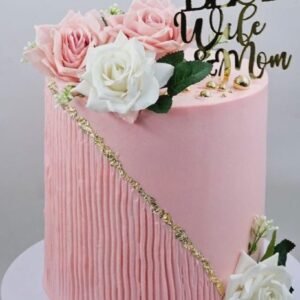 Pink stylish tall cake with diagonal lines