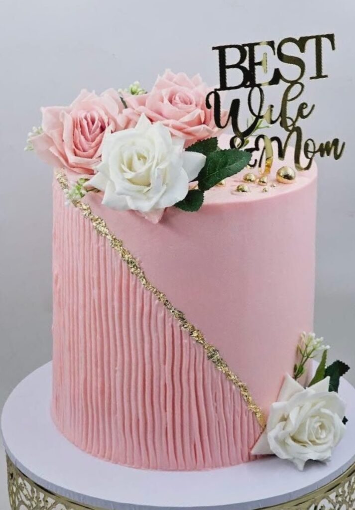 Pink stylish tall cake with diagonal lines