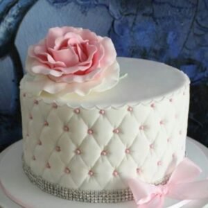 White criss cross beaded cake
