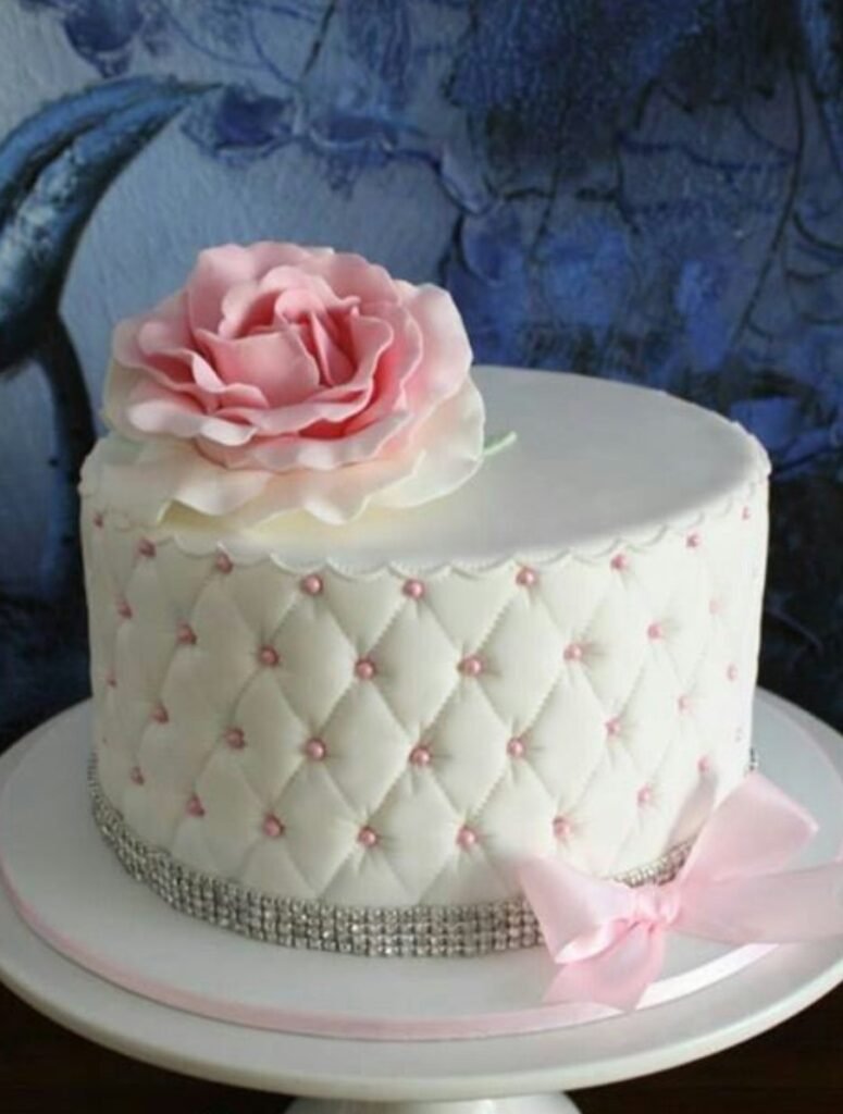 White criss cross beaded cake