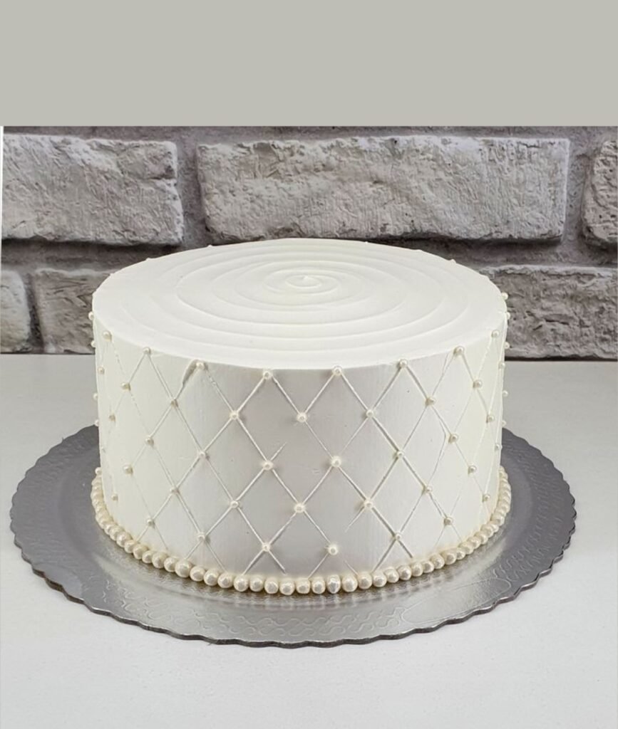 White criss cross cakes with beads